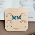 7-day earring set with butterfly and rose studs on a weekly card - Blue Butterfly Style With Antennas (HDB7)