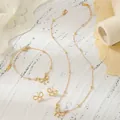 Elegant gold-plated jewelry set with bow pendants including necklace, bracelet and earrings - Gold Bow-Knot 3-Piece Jewelry Set (ZJ16905)