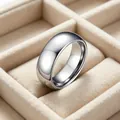 Macro view of a polished silver 8mm stainless steel domed band ring in a jewelry box - Size 7 / Curved Polished Plain Ring / Steel