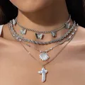 Élégant collier argenté multi-rangs avec croix en perle et breloques papillon femme - 31364-nek-s-ep