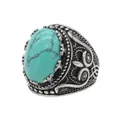 Vintage stainless steel ring featuring a large oval turquoise stone and intricate metal carvings - US 7 / Steel Green Stone
