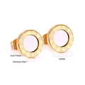 Detail view of 10mm gold-plated stainless steel earrings with engraved Roman numerals - Roman Numeral Ring With White Shell Style (EA50600AG)