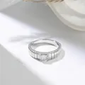 Macro view of silver titanium steel ring with textured vertical band and round gemstone - US 7 / Silver White Rhinestone