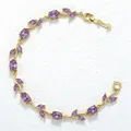 Exquisite detail of gold-plated branch bracelet with sparkling purple leaf-shaped stones - Gold Purple Zirconia Tulip