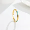 Detailed view of elegant gold titanium steel ring with inlaid blue turquoise stones - US 7 / Blue Turquoise (A250) - Gold