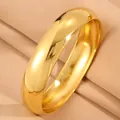 Elegante gladde goudkleurige titanium stalen gebogen bangle armband voor koppels - Gebogen gladde armring / 15mm Breedte / Goud