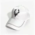 Detailed view of white satin baseball cap with black rhinestone deer head and chain trim. - Adult Size (58cm Adjustable) / White