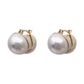 Close-up detail of elegant gold-toned hoop earrings featuring large lustrous white pearls. - Artificial Pearl Hoop Style (XJE0010)