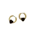 Macro detail shot of minimalist golden hoop earrings with black heart charms on white - Black Heart Hoop Style (XJE0016)