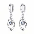 Macro detail of silver geometric twist drop earrings with sparkling round zirconia stone. - Spiral Twisted Line Dangles (XJE0027)