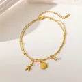 Detailed view of a gold-toned titanium steel anklet with shell and starfish charms for beach wear - Double-layer Shell Starfish Style (JL2049J) / Gold
