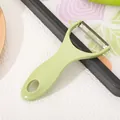 Hellgrüner Keramik-Obst- und Gemüseschäler mit ergonomischem Griff für die Küche - Edelstahl-Stil / Nordisches Grün