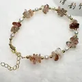 Elegant freshwater pearl bracelet featuring natural crystal chips and golden hardware finish - Rutilated Quartz and Baroque Freshwater Pearl