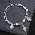 Retro silver-colored hip-hop charm bracelet with cross and engraved heart pendants - Cross & Quote Style (SL0199)
