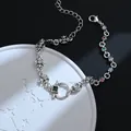 Vintage silver cross bracelet featuring multi-color zircons and intricate iris fleur-de-lis motifs - Colorful Zirconia Cross Style (SL0575)