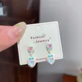 Süße Macaron-Herz-Ohrhänger mit Perlglanz-Finish und blauem Schleifendetail - Orangefarbenes Prinzessin Herz