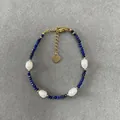 Detail view of blue stone beads and white pearls on a gold-toned beaded bracelet - Dark Blue Faceted Beads with Artificial Pearl (Bracelet 11) / 17+3cm