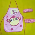 Detail showing cute cartoon monkey print on pink waterproof EVA children's apron set - Monkey Apron and Sleeve Set / Pink