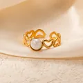 Elegant vintage gold-plated titanium steel ring with hollow hearts and a central white pearl - Openwork Heart Pearl Adjustable Style (TYR1020)