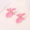 Vibrant pink matte lacquer flower earrings with golden center for party fashion - Pink
