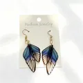 Elegant gradient blue butterfly wing drop earrings with gold hooks on white card - Gradient Style / Blue