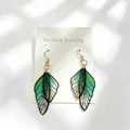 Elegant green gradient butterfly wing earrings with golden glitter detail - Gradient Style / Green