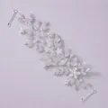 Elegant silver crystal bridal hair vine with flower and leaf design on purple base - Bridal Travel Shoot Headband HS-J6254
