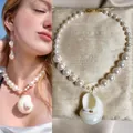 Minimalistische parelketting met natuurlijke schelphanger in elegante SKU-variant - Oversized schelpparel schelpketting / 38+5cm / Crèmewit verloop