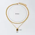 Elegante dubbellaagse 18k vergulde halsketting met een zwarte rechthoekige stenen hanger - Zwarte Inleg / Normale Specificatie