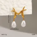 Elegant gold finish stainless steel drop earrings featuring lustrous white teardrop pearls - Crisscross Curve Drop Artificial Pearl (BJGE2409)