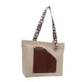Large canvas tote bag with brown leather pocket and patterned straps for commuting. - White