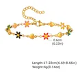 Pulsera de acero inoxidable dorada con dijes de flores y corazones ajustable - Estilo Flor y Corazón Multicolor (2189G)