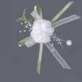 Elegant white floral wrist corsage with green ribbons and pearl accents for weddings - Forest Style Camellia Corsages