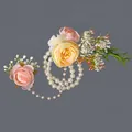 Elegant floral wrist corsage with pink and yellow roses and pearl chains - Pink Flower Luxury Hand Chains