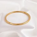 Bracelet jonc minimaliste en acier inoxydable doré pour femme - Style Cercle Fermé Simple / Or