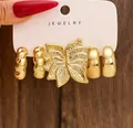 Übertriebenes goldenes geometrisches Ohrring-Set mit gedrehten Creolen und Blumendesign - Blumenform-Stil (8743) / 3er-Set / Gold