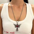 Gothic stainless steel necklace featuring a winged cross and a red eye pendant. - Red Eye Winged Cross (3248) / Antique Silver