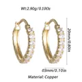 Gold plated copper hoop earrings with clear cubic zirconia stones, 20mm diameter. - Gold Row Zirconia Hoop Earring (YSE046-02)