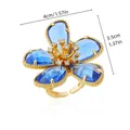 Vue détaillée de la bague fleur en cristal bleu plaqué or avec dimensions précises - G4284442 (Cuivre)
