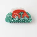 Detailed macro view of vibrant red fish design on green marbled acetate hair claw clip - Red Carp (6#)