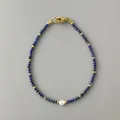 Élégant bracelet en perles de cristal bleu avec une perle d'eau douce naturelle - Style perle cristal bleu foncé (Bracelet 26)