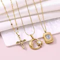 Fashionable gold plated necklace set with cross, celestial moon and heart crystal pendants - 3-Piece Necklace Set / 18K Gold / Gold