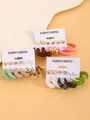 Assorted six-pair resin earring set featuring stylish hoops and studs in vibrant colors - 18-Card 3-Piece Set