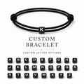 Minimalist black braided wax cord bracelet featuring custom alphabet bead options A to Z - Letter A Style (BN-0201-A)