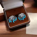 Elegante zilverkleurige kwastjes oorbellen met levendige blauwe turquoise kralen - Turkoois Vuurwerk Kwastje Stijl (E3153) / Zilver