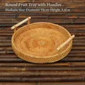 Bandeja redonda mediana de ratán tejida a mano con asas de madera, 24 cm de diámetro - Bandeja de Frutas con Asa / Mediano (24x3cm)