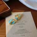 Elegante vergulde oorringen met prachtige vintage blauwe turquoise stenen inleg. - Waterdruppel Turkoois Stijl (E3061) / Goud