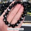 Nahaufnahme von hochwertigem natürlichem Silber-Obsidian-Armband mit Katzenaugeneffekt - Premiumqualität