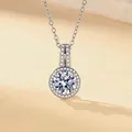 Elegant silver-toned necklace with round brilliant-cut cubic zirconia and halo pendant - Necklace (With Cross Chain) / Silver (White Zirconia)
