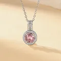 Elegant silver necklace featuring a brilliant pink round zircon pendant with halo - Necklace (With Cross Chain) / Silver (Pink Zirconia)